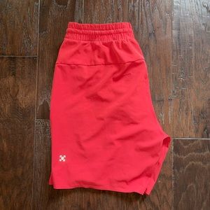 Lululemon Men’s Channel Cross Swim Trunks.  7” inseam. Red. Medium.